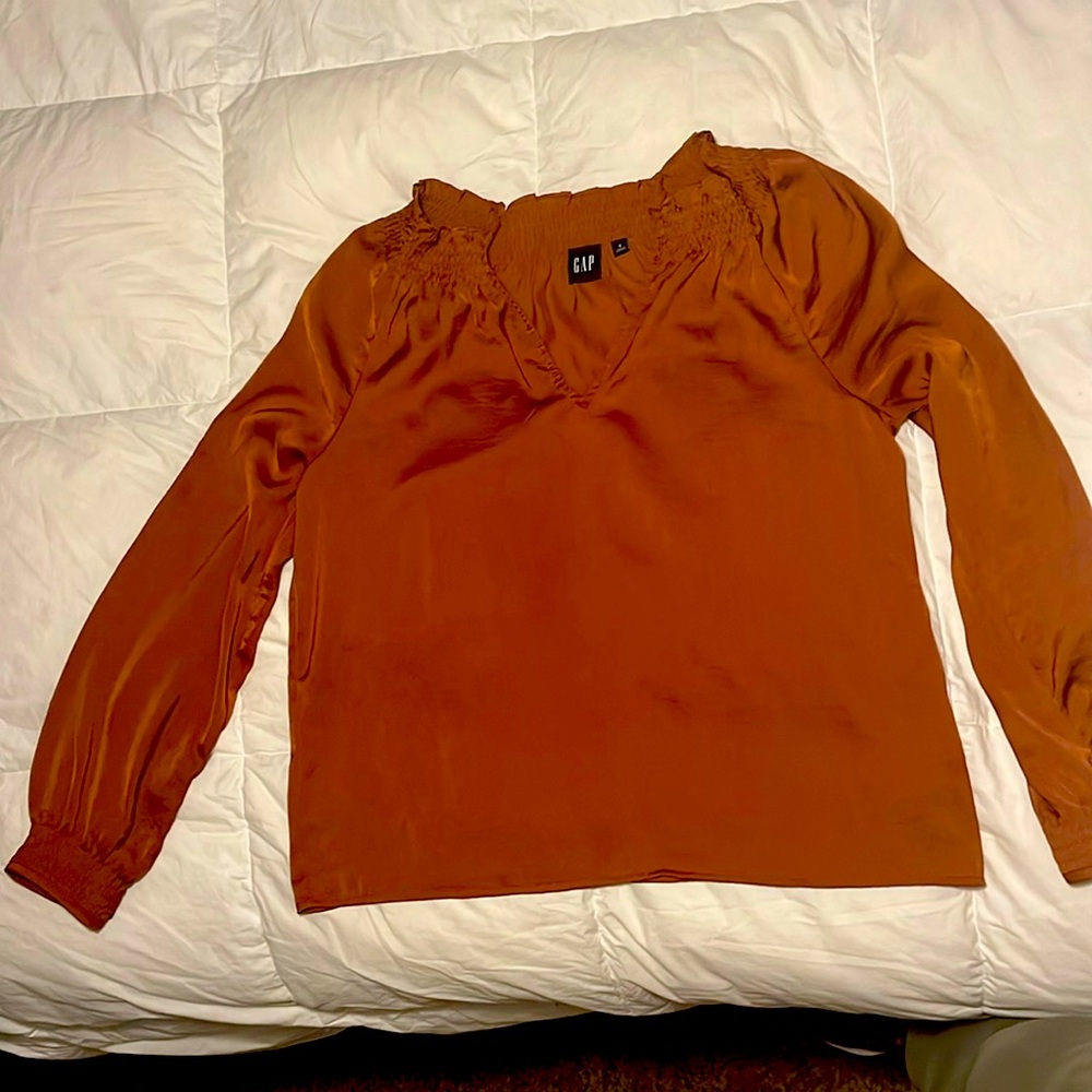Long sleeve satin woman’s Gap top.